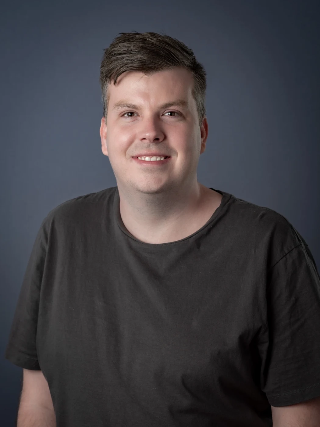 Professional portrait of Ash Sexberg
